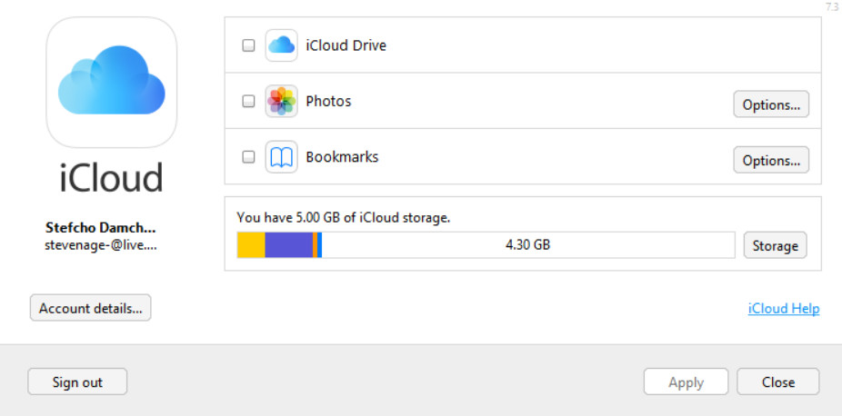 icloud photos not downloading to windows 10