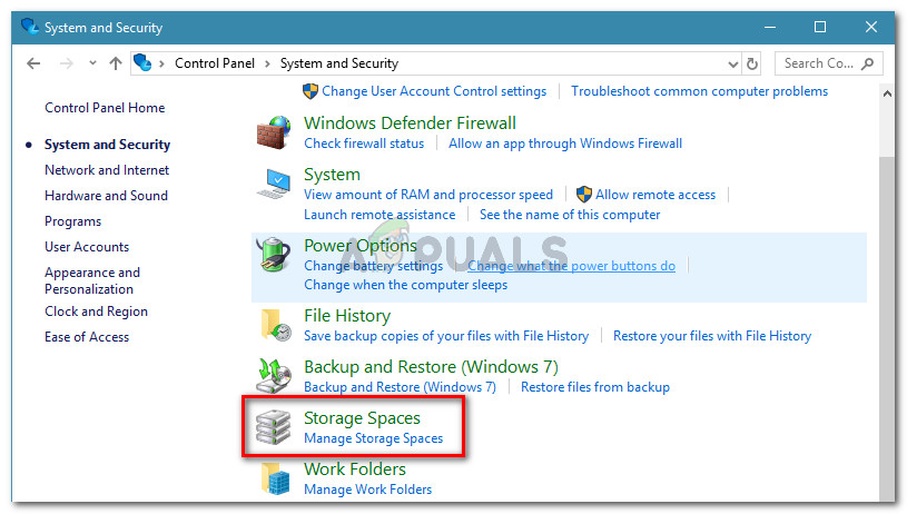 Go to System and Security, then click on Storage Spaces