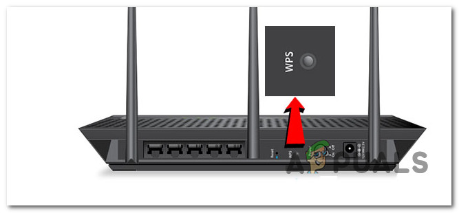 Press the WPS button on the router