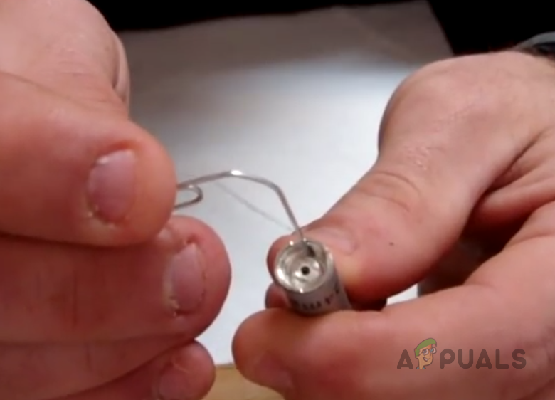 Use A Paperclip to Pull the Pen's Central Pin Up