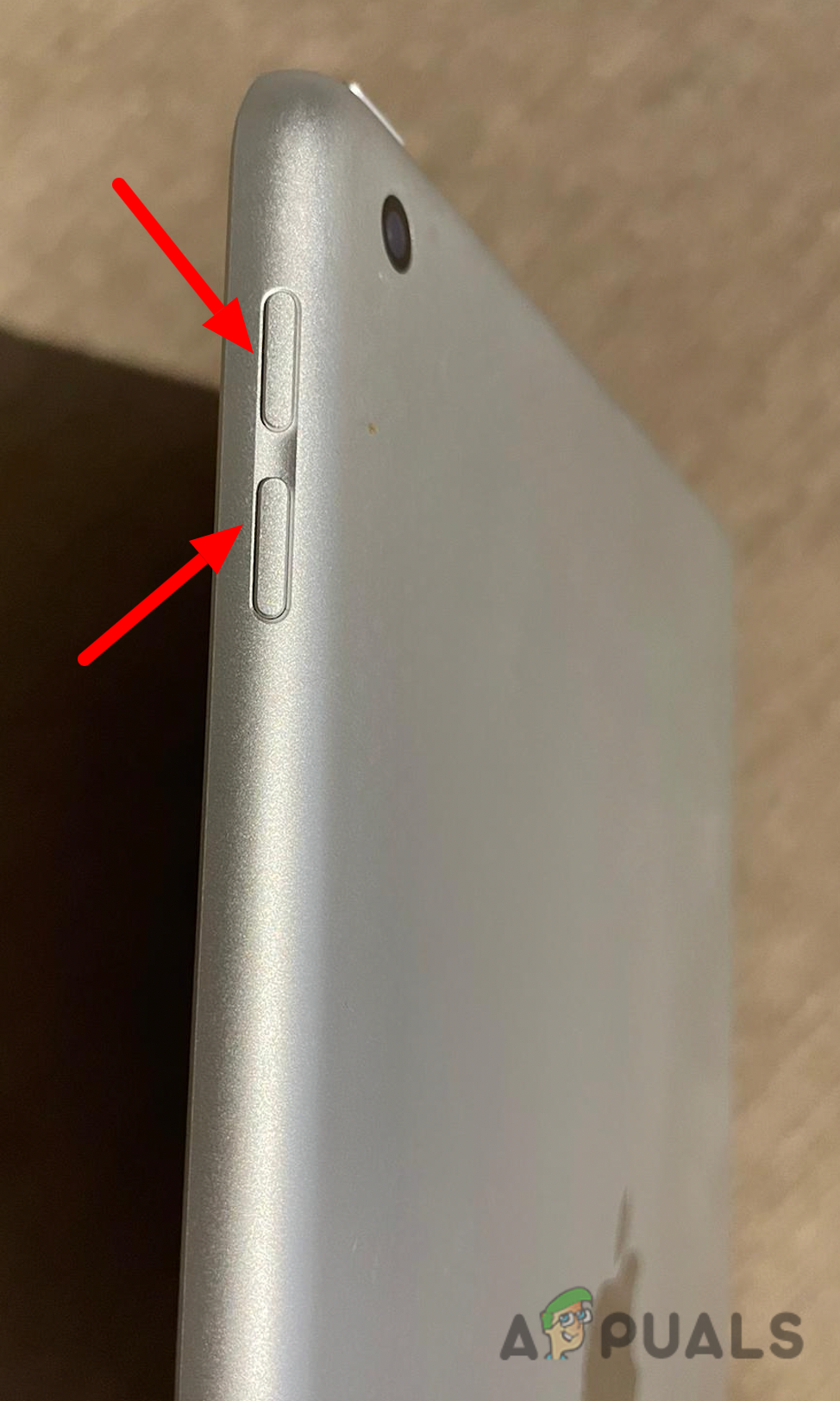 Pressing the volume up + volume down button