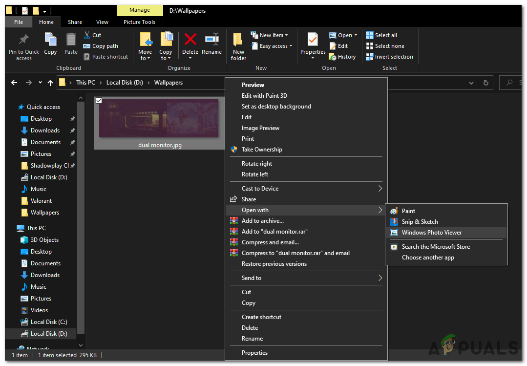 RIght Click on the image and select Windows Photo Viewer in the open with context menu.