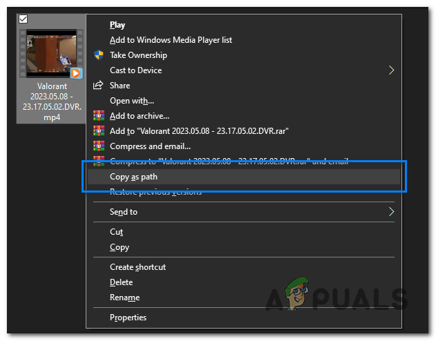 hold down the Shift key on your keyboard and right-click on the file. In the context menu that appears, select "Copy as path".