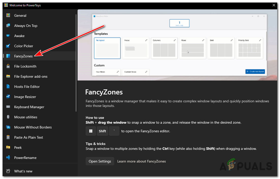 In the PowerToys window, navigate to the "FancyZones" tab.