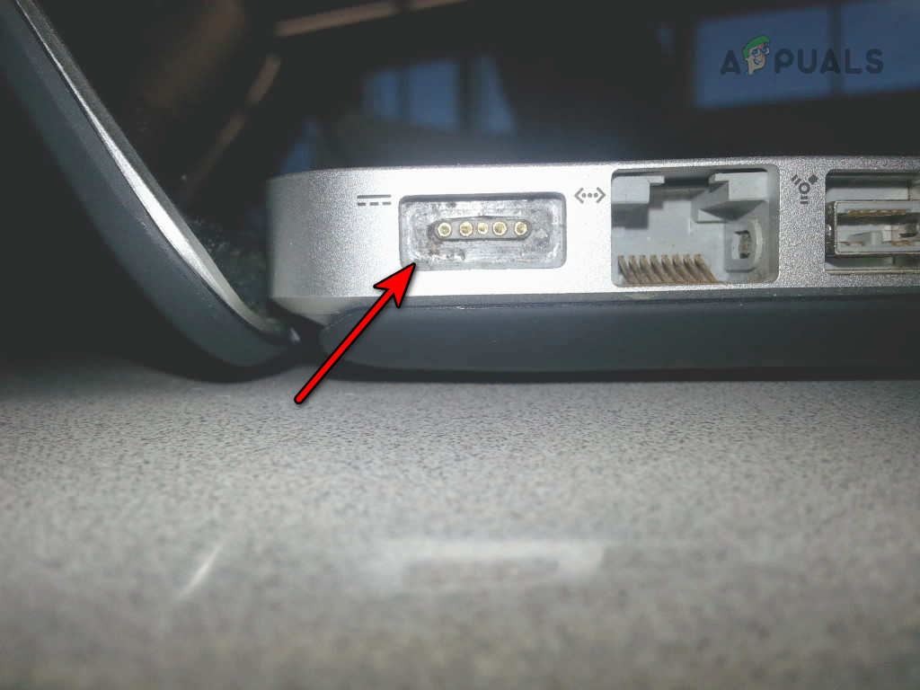 Clean the Charging Port of the MacBook