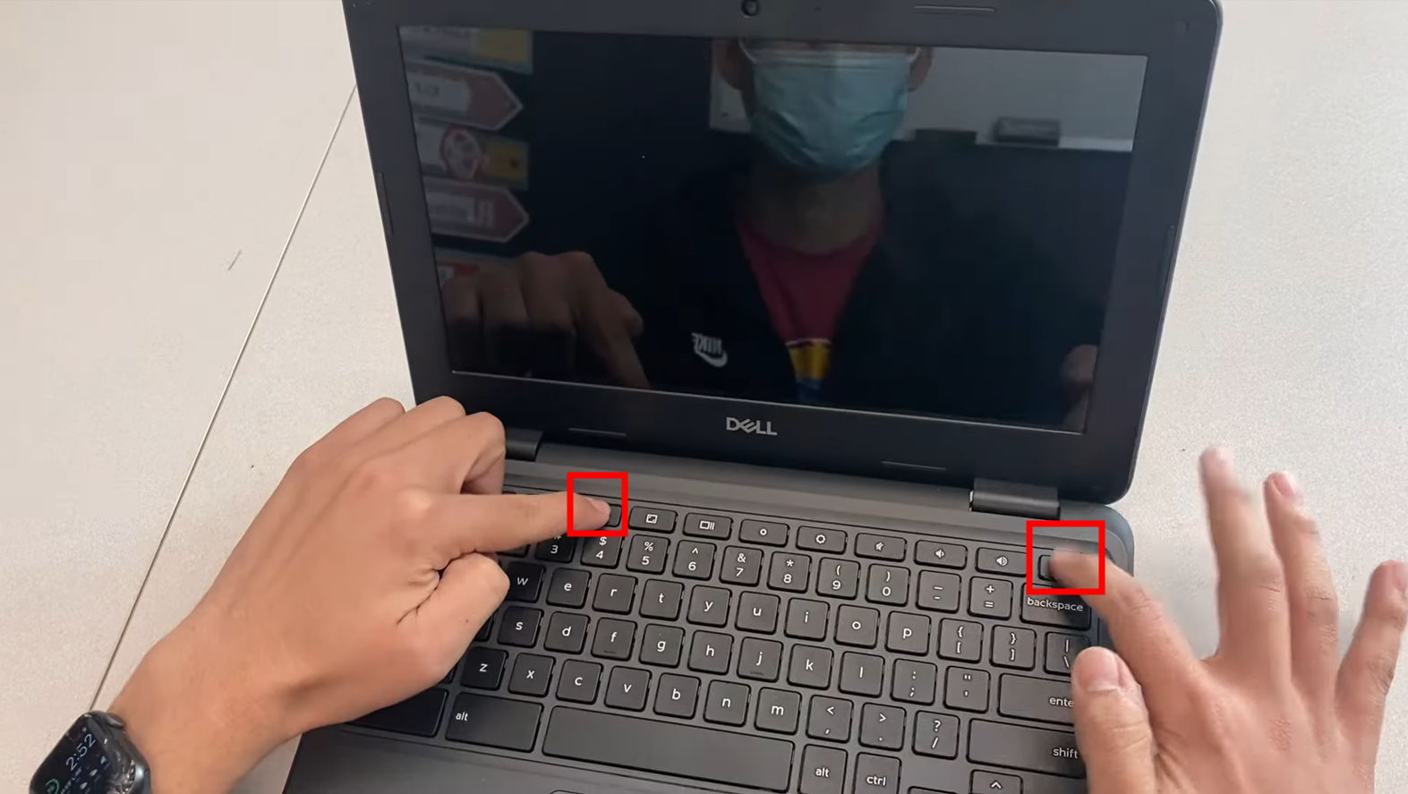 Press and hold both buttons