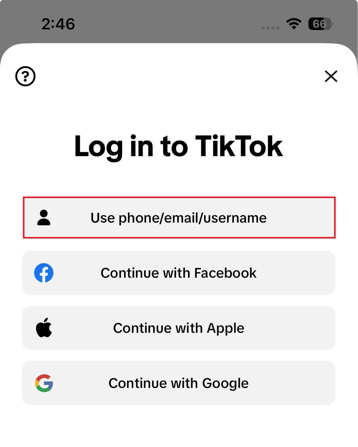 TikTok login screen showing Use phone email username and alternate verification methods.