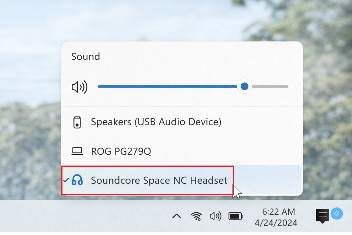 Windows 11 quick sound output picker selecting a Bluetooth headset or speaker as the active output device.