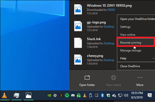 OneDrive cloud icon in the Windows notification area showing paused sync and the Resume option.