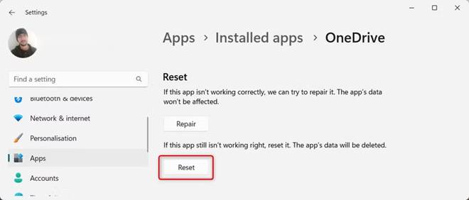 Windows App settings for OneDrive showing the Reset option while fixing a shared folder sync issue.